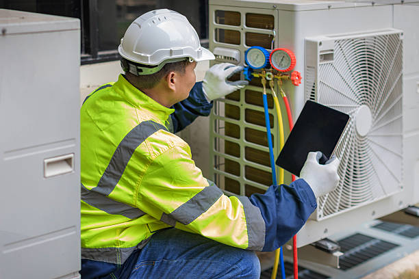 Professional Ductwork Repair technician working in Pinehurst, MA